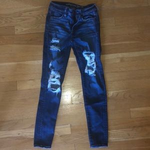 AE ripped super stretchy dark wash jeans.